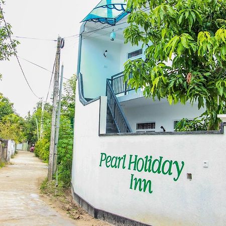 Pearl Holiday Inn Мириса Екстериор снимка